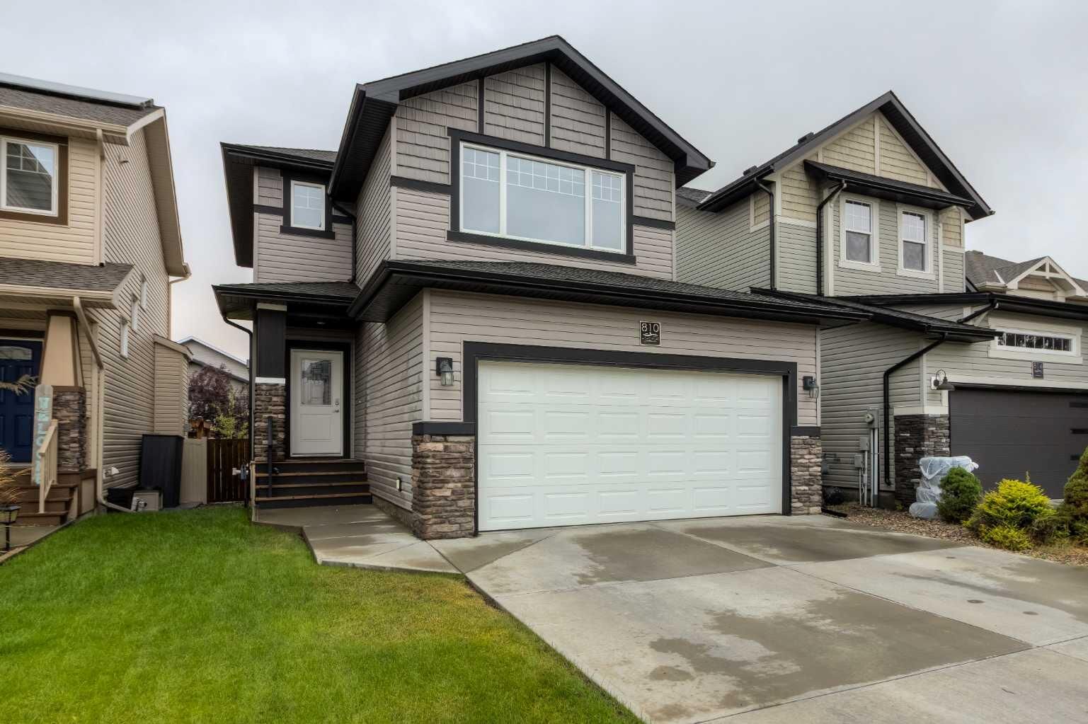 Property Photo: 810 Keystone Meadows W AB T1J 5C4