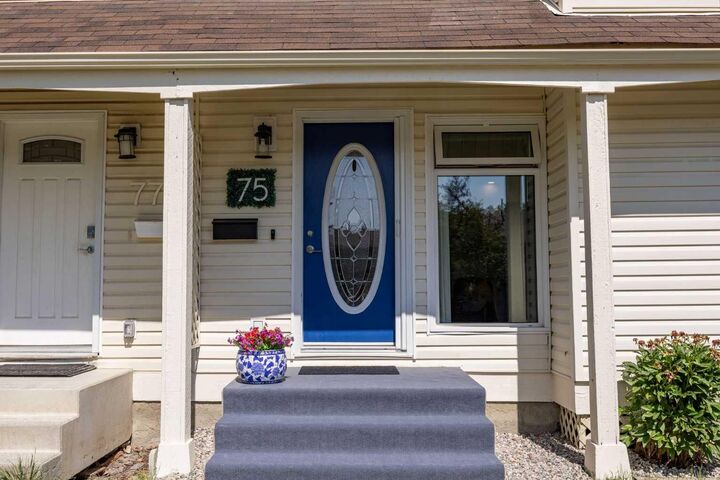 Property Photo: 75 Woodhill Court SW AB T2W 3P1