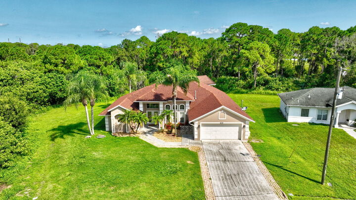 Property Photo:  6119 NW Gause Avenue  FL 34986 