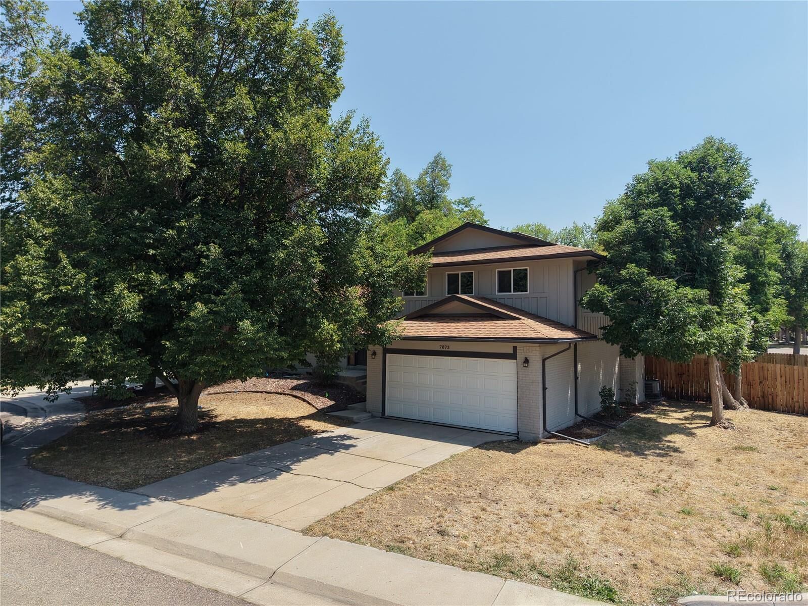 Property Photo:  7073 E Warren Drive  CO 80224 