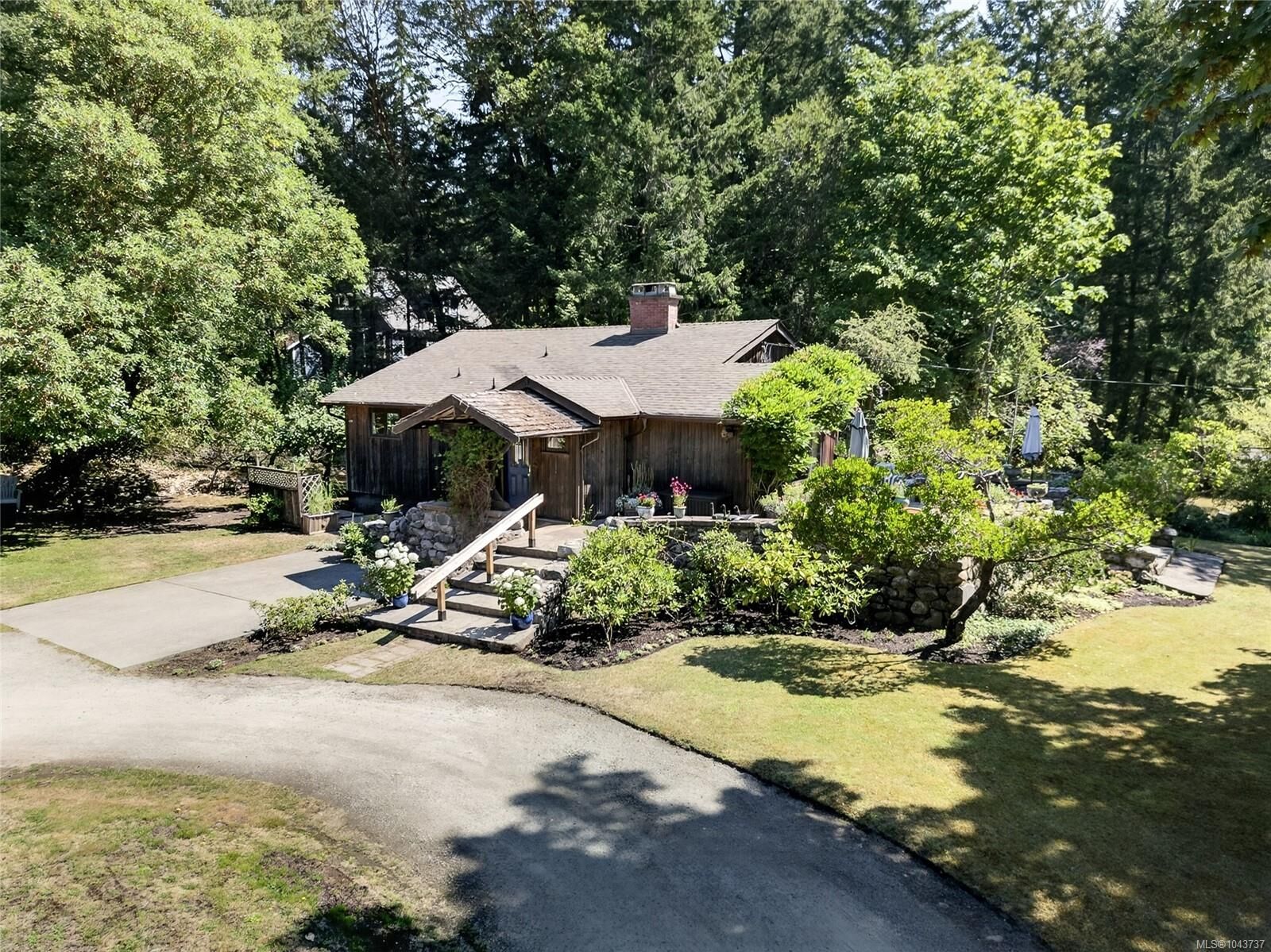 Property Photo:  1390 Laurel Rd  BC V8L 5K8 