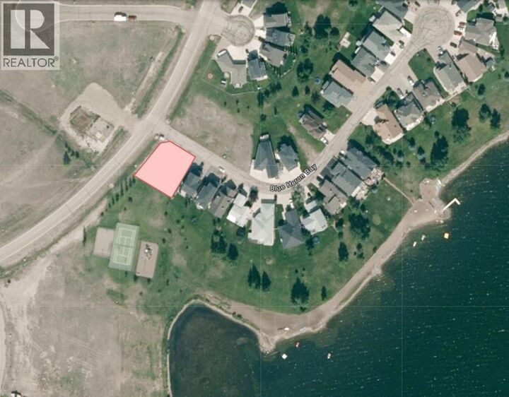 Property Photo: 58 Blue Heron Bay AB T1R 1C5