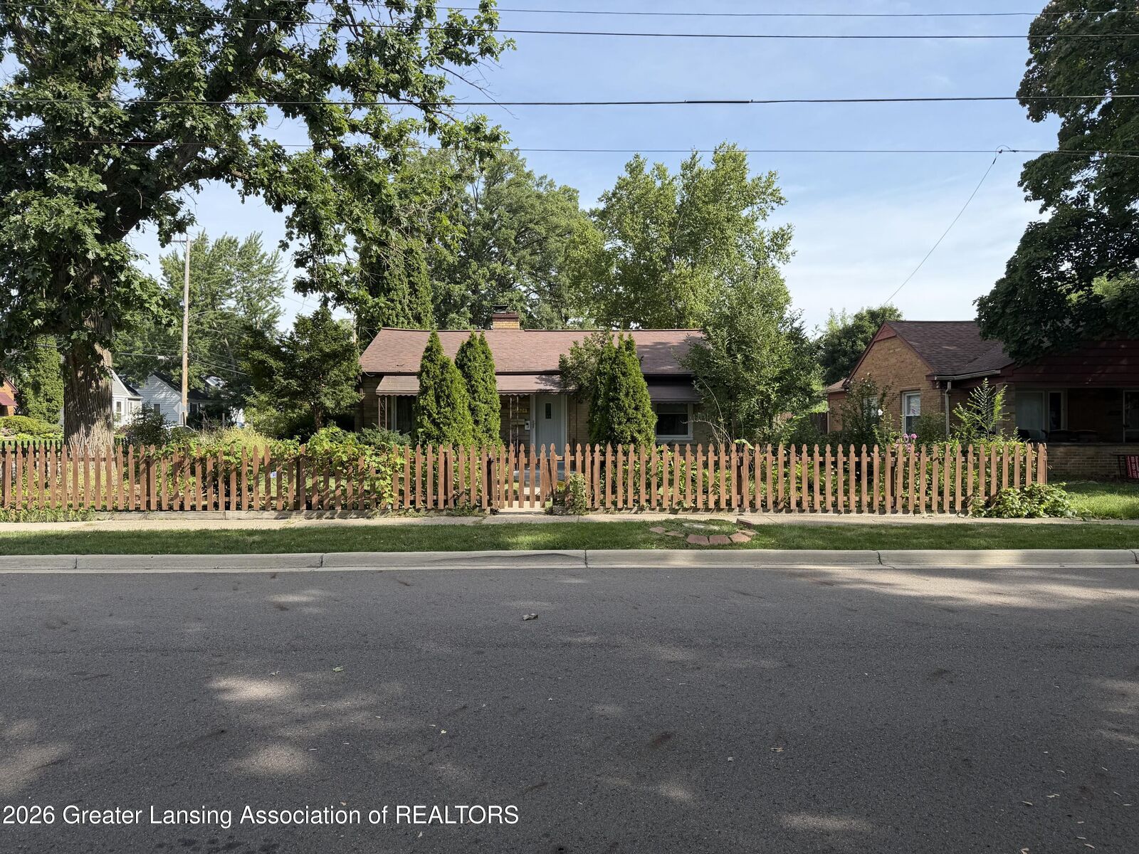 Property Photo:  1424 Poxson Avenue  MI 48910 