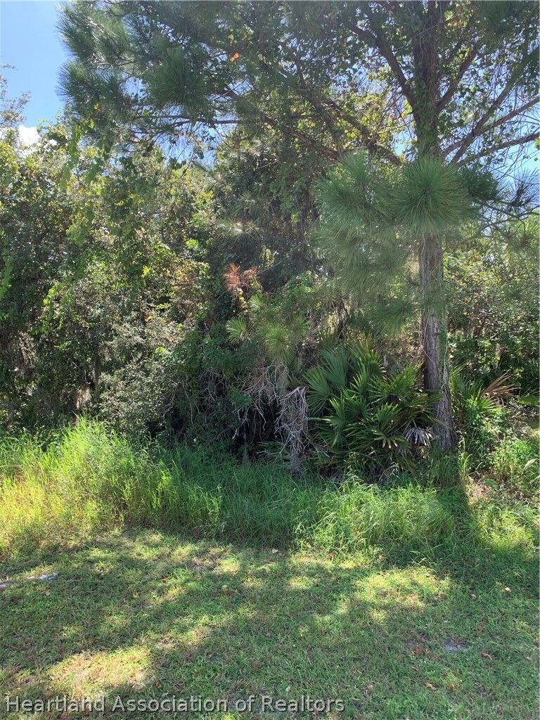 Property Photo: 10513 S Orange Blossom Boulevard FL 33875