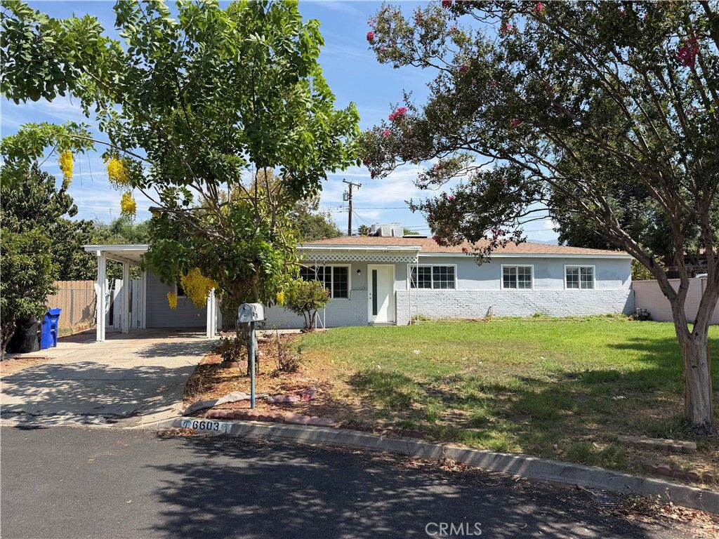 Property Photo: 6603 Mitad Court CA 92404