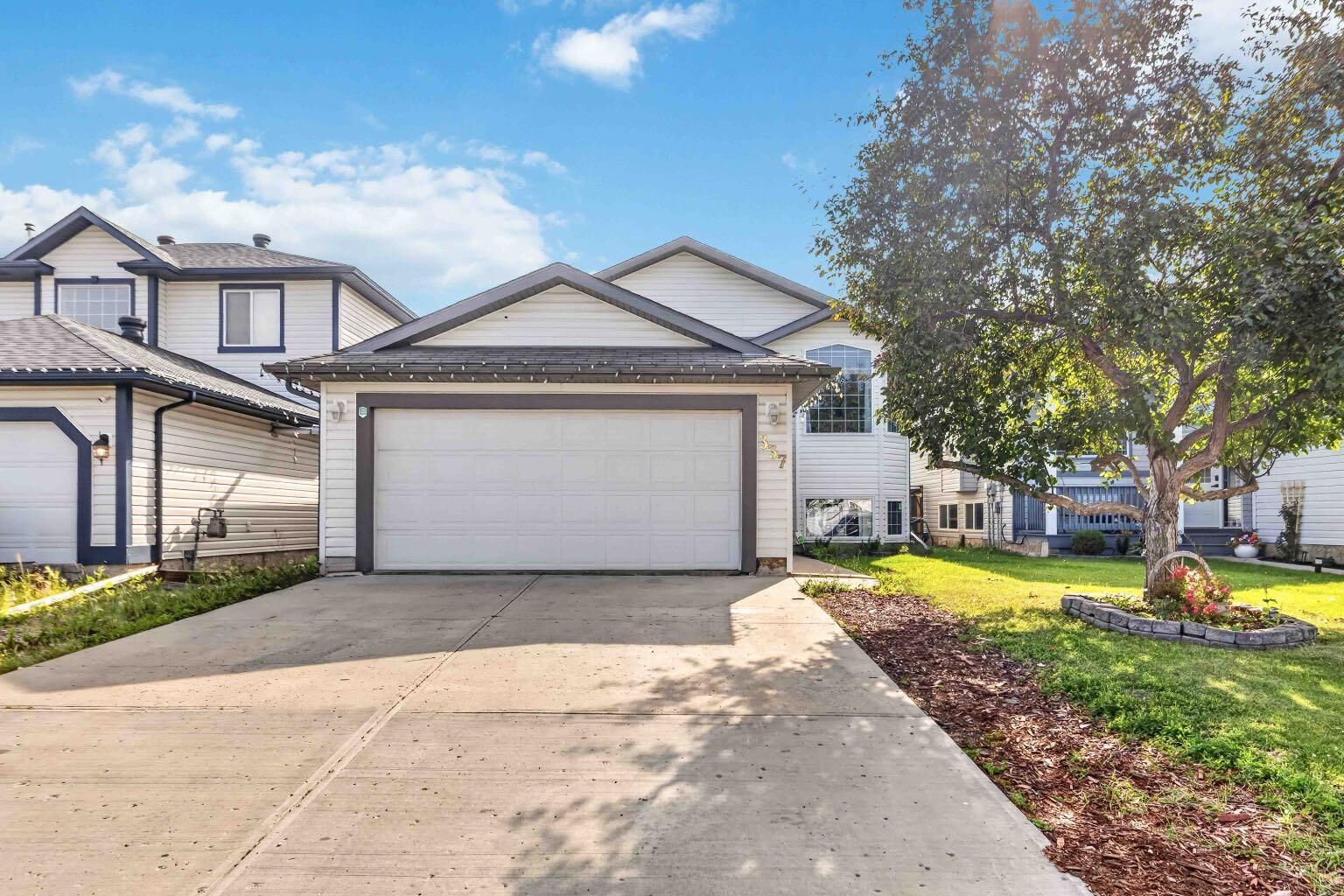 Property Photo: 337 Diefenbaker Drive AB T9K 2K1