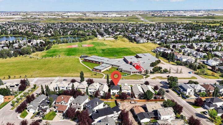 Property Photo: 446 Harvest Hills Drive NE AB T3K 4Z4