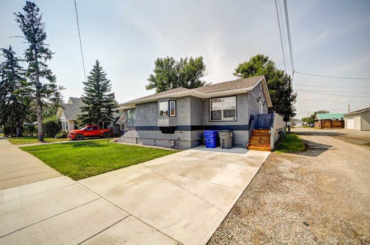 Property Photo:  5113 2 Street W  AB T0L 0T0 