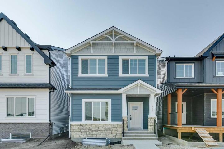 467 Buffaloberry Manor SE — photo 1
