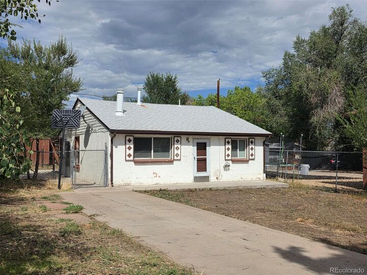 Property Photo:  235 S Meade Street  CO 80219 