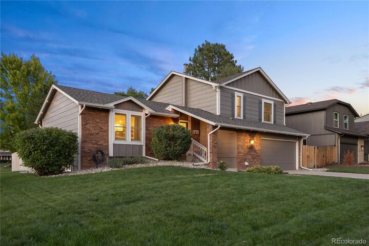 Property Photo: 11025 E Berry Avenue CO 80111