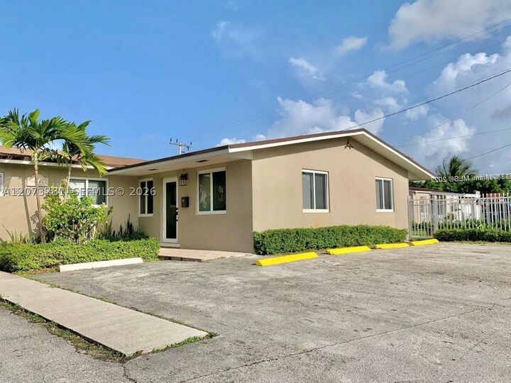 Property Photo:  10302 NW 35th Ct  FL 33147 