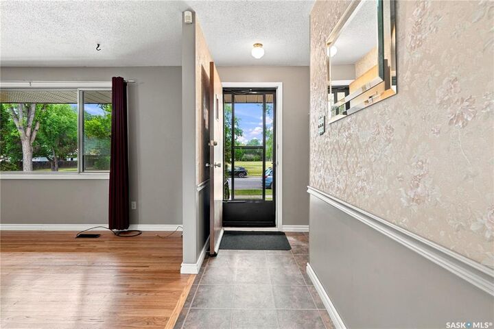 Property Photo: 219 Cambridge Avenue SK S4N 0L6
