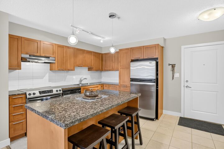 Property Photo: 19673 Meadow Gardens Way 234 BC V3Y 0A1