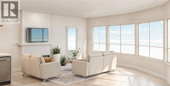 Property Photo:  7815 Wallace Drive 207  BC V8M 2B1 