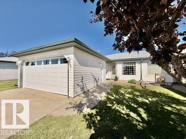 Property Photo:  5714 50 Street 4  AB T9A 3R3 