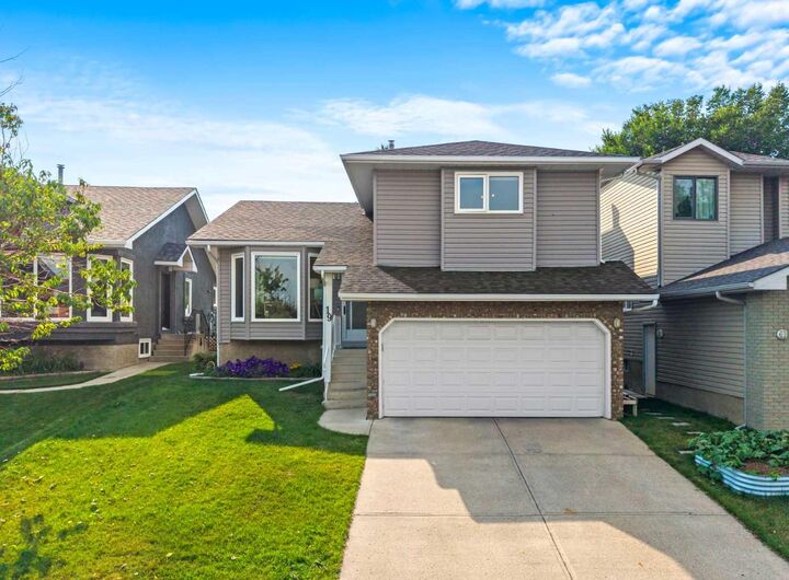 Property Photo: 19 Macewan Meadow Crescent NW AB T3K 3H6