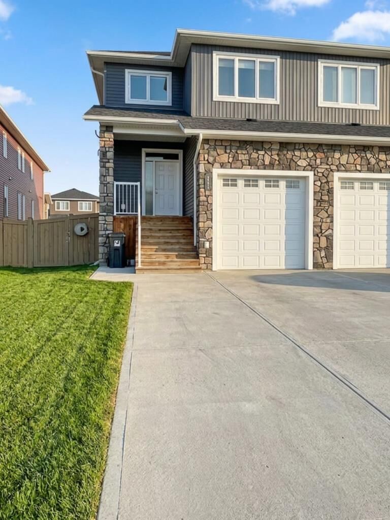 Property Photo:  10306 148 Avenue A  AB T8X 0S1 