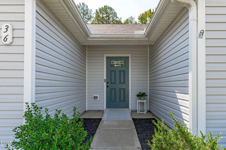 Property Photo:  36 Hunting Wood Drive  NC 27501 