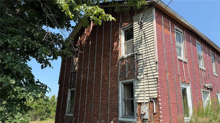Property Photo:  14909 Ridge Road W  NY 14477 