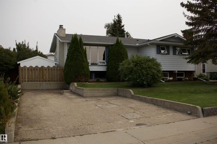 Property Photo:  10707 108 Ave  AB T1P 1C7 