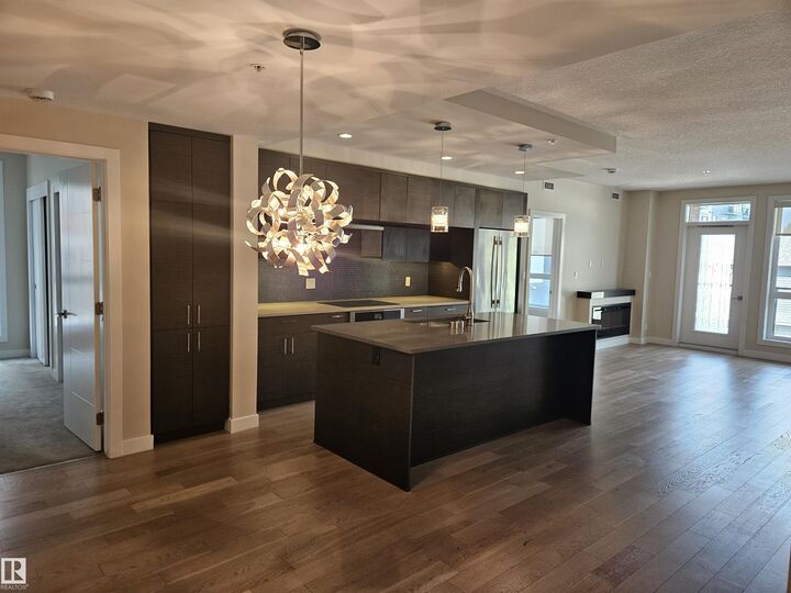 Property Photo:  11710 87 Avenue NW 207  AB T6G 0Y3 