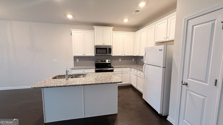 Property Photo:  7085 Gladstone Circle  GA 30038 