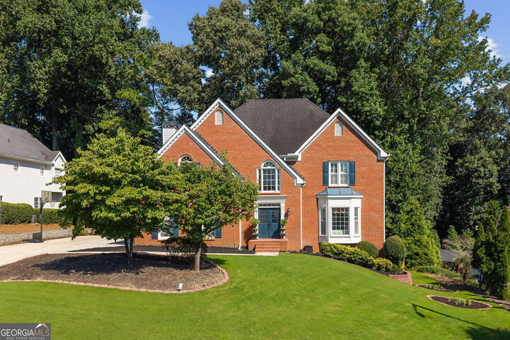 Property Photo:  10245 Groomsbridge Road  GA 30022 