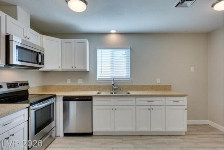 Property Photo:  135 Greenbriar Townhouse Way  NV 89121 
