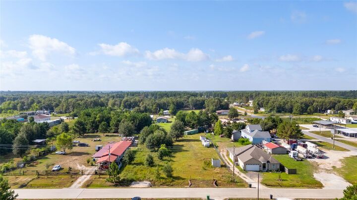 Property Photo: 1200 County Road 5017 TX 77327