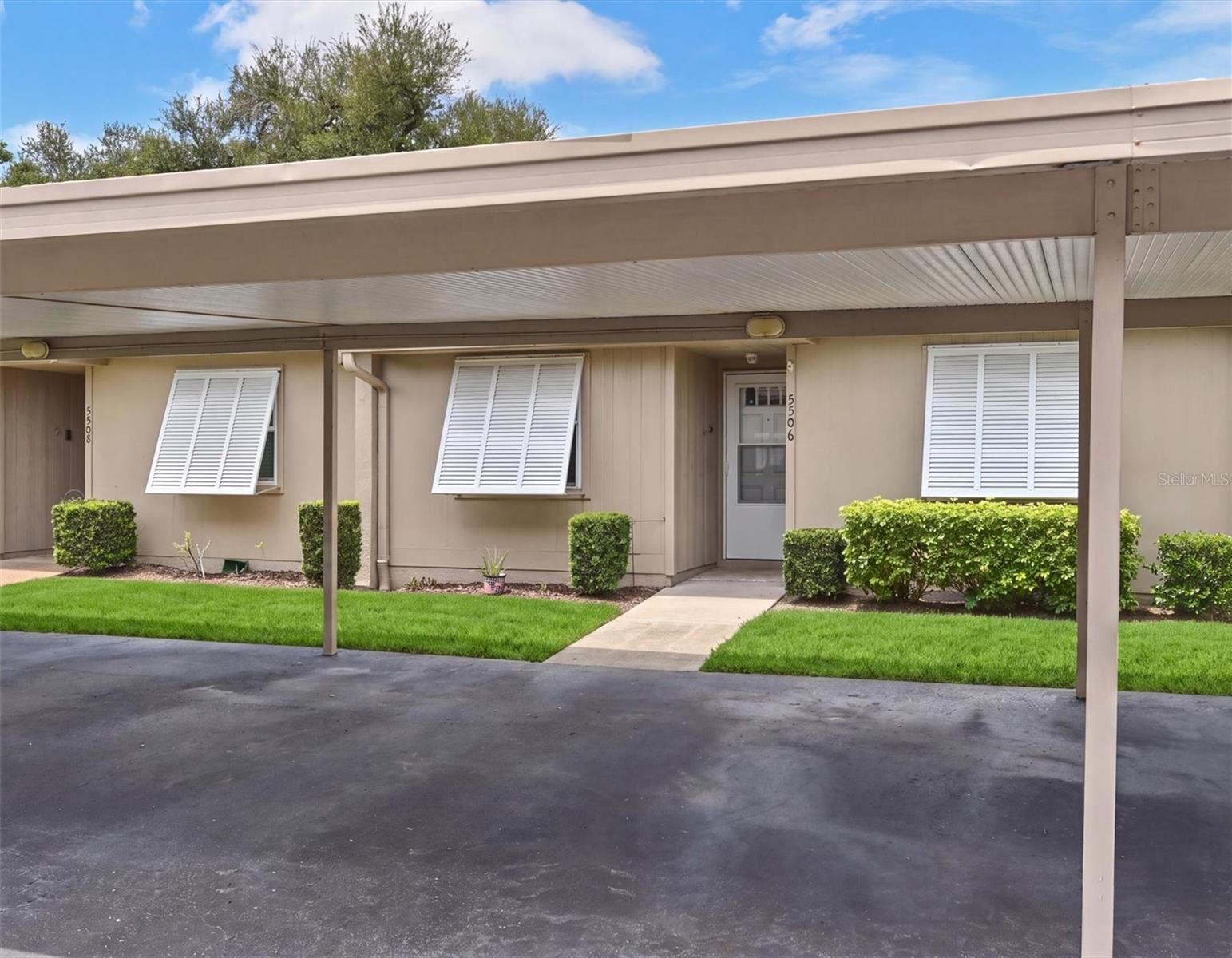 Property Photo:  5506 37th Street E 4  FL 34203 