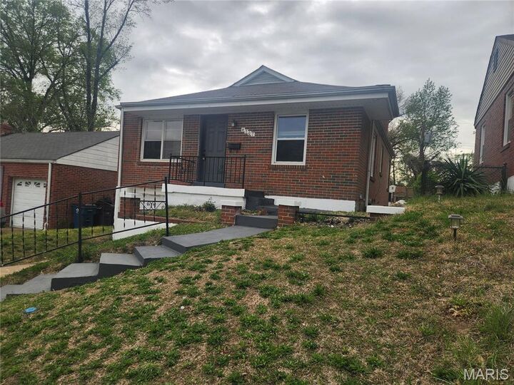 Property Photo:  4707 Roxie Street  MO 63121 