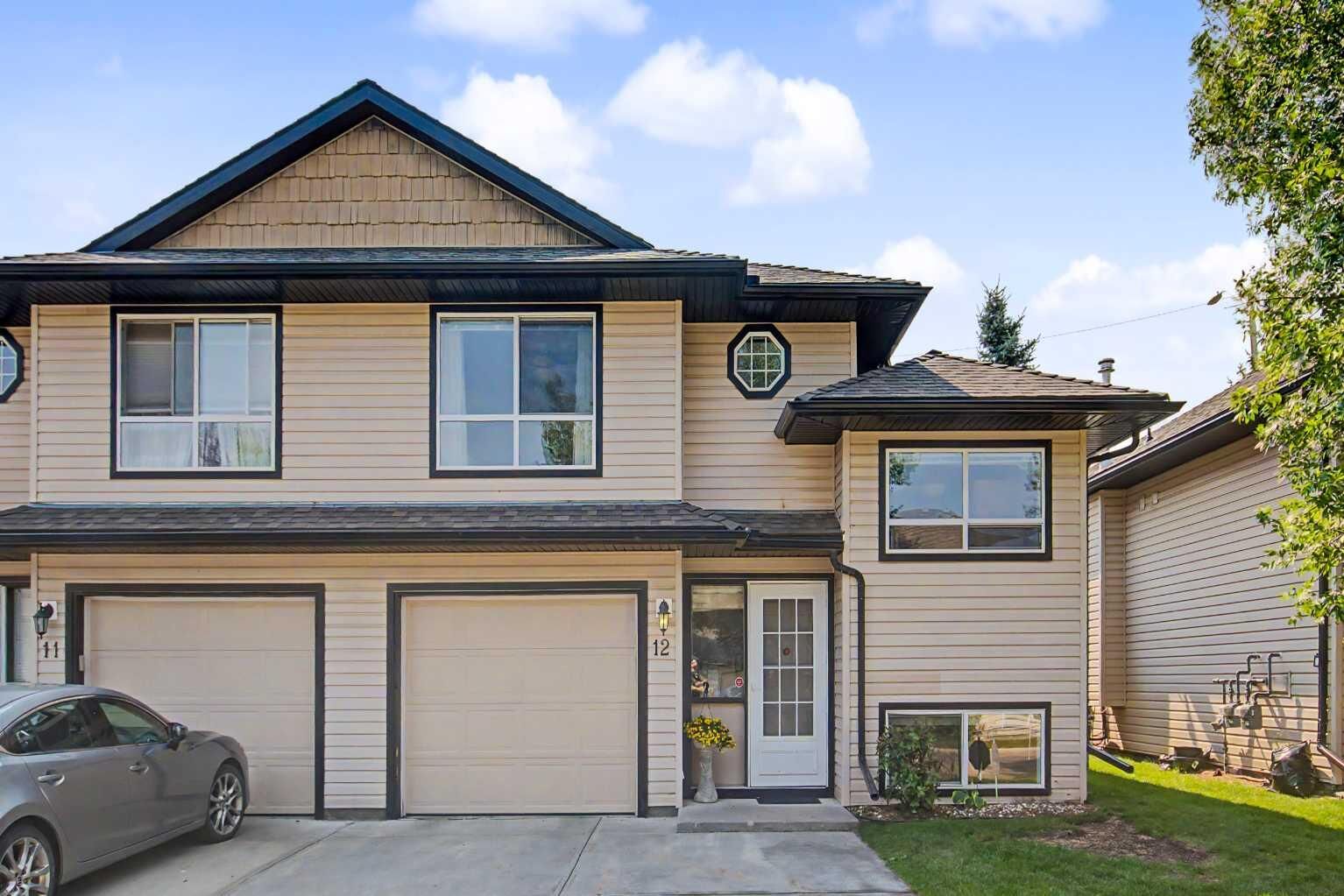 Property Photo:  103 Fairways Drive NW 12  AB T4B 2Y5 