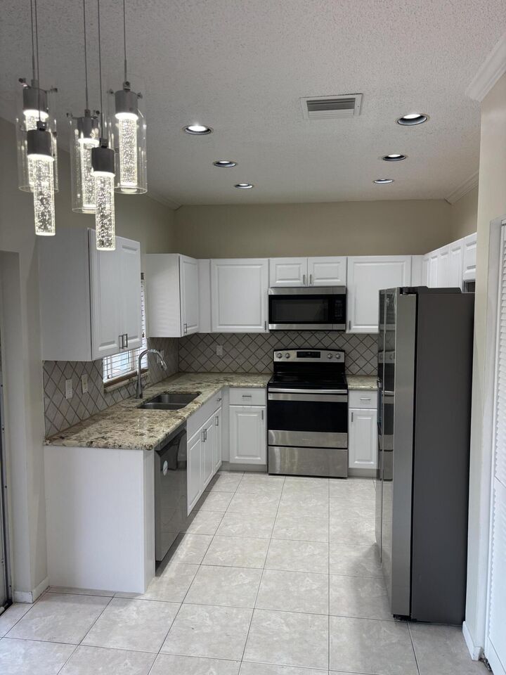 Property Photo:  10837 Palm Spring Drive  FL 33428 