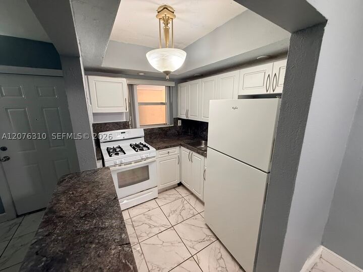 Property Photo: 350 E 21st St 108 FL 33010
