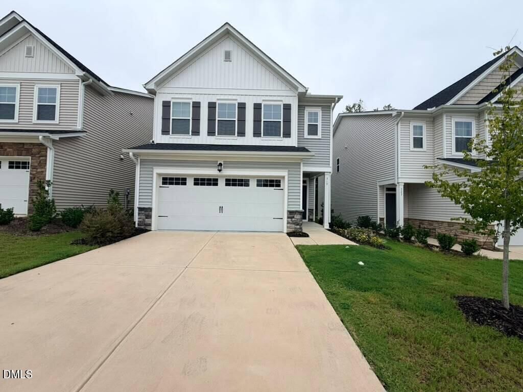 Property Photo:  319 Aster Bloom Lane  NC 27610 