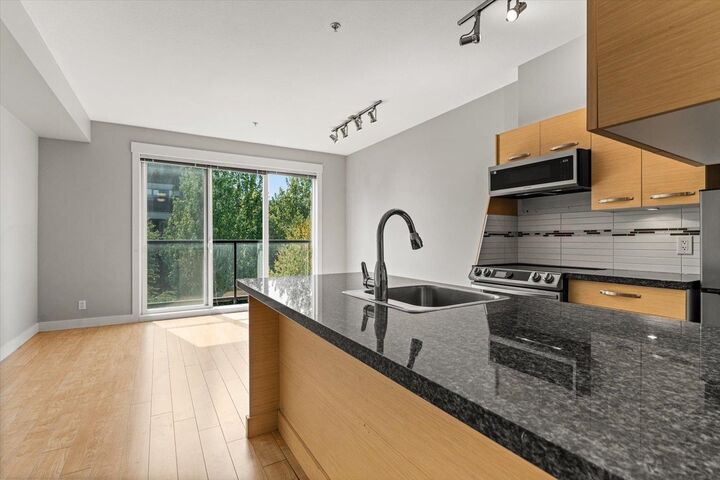 Property Photo:  33539 Holland Avenue 310  BC V2S 0C6 