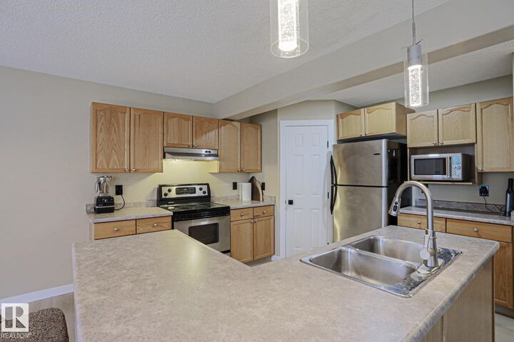 Property Photo:  8 Erinwoods Place  AB T8N 7B2 