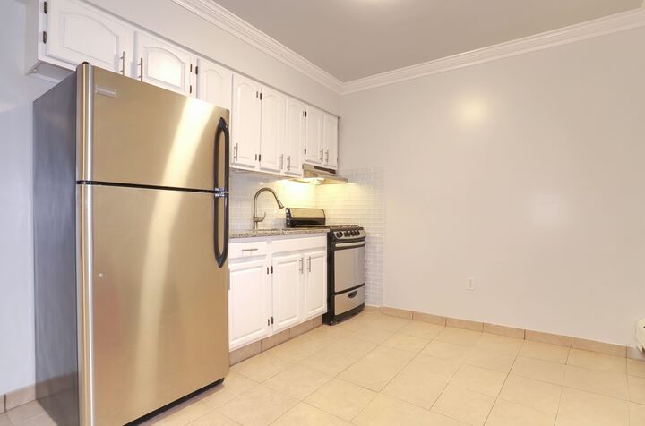 Property Photo: 6311 Dewey Ave 1 NJ 07093