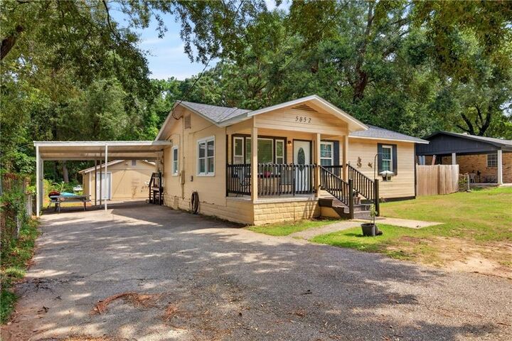 Property Photo: 5852 University Avenue AL 36618