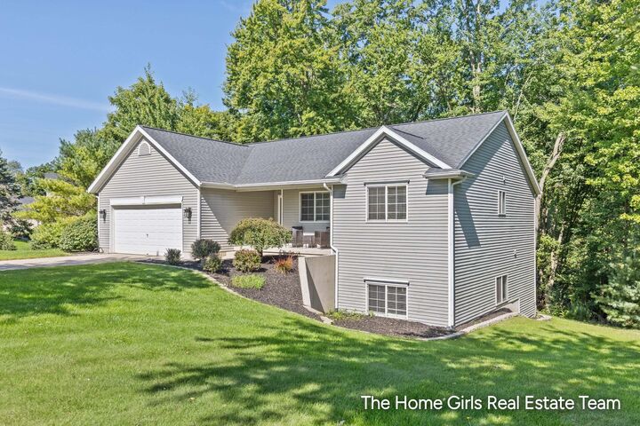 Property Photo: 10333 Meadowgate Drive NE MI 49345