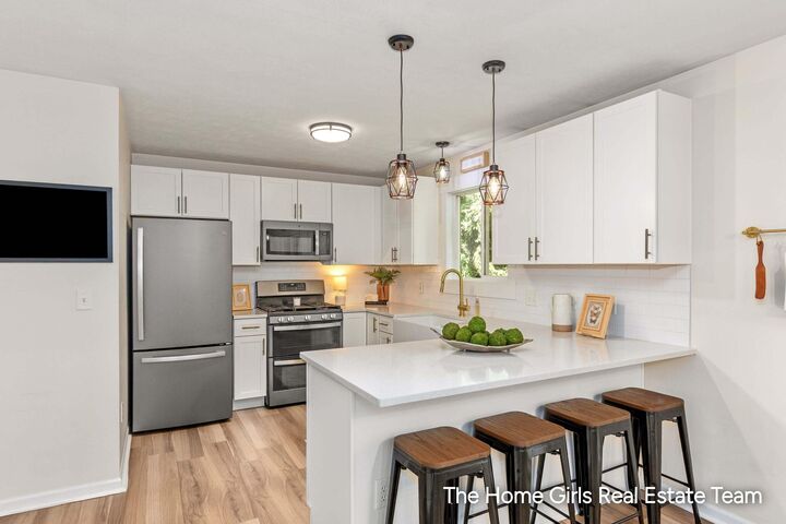 Property Photo: 10333 Meadowgate Drive NE MI 49345