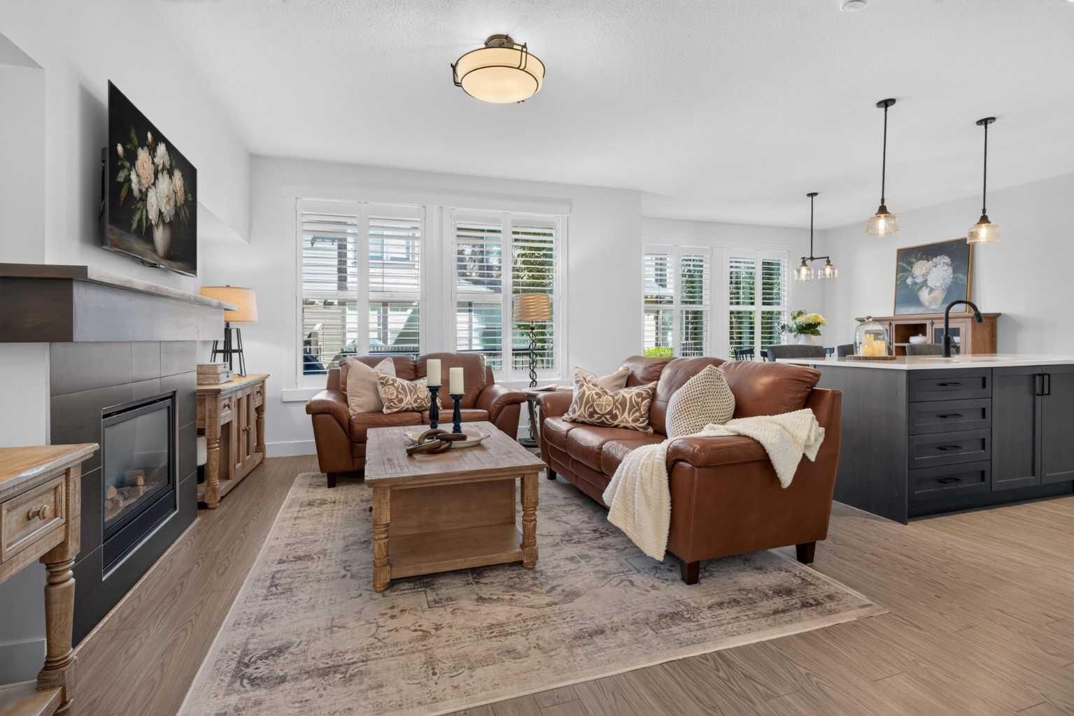 Property Photo: 110 Coopers Common SW 202 AB T4B 3Y3