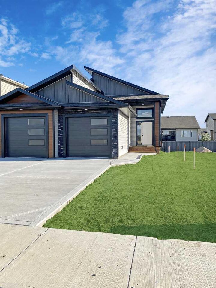 Property Photo:  10209 128 Avenue B  AB T8V 6T1 
