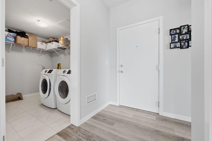 Property Photo:  4150 Seton Drive SE 224  AB T3M 3C7 