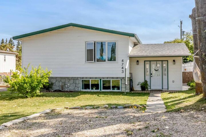 Property Photo: 4743 47 Street AB T4S 1M8