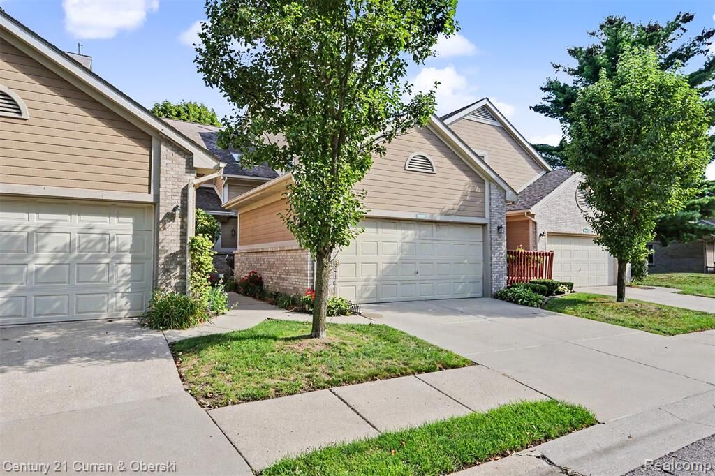 Property Photo:  9398 Westwind Drive 49  MI 48150 