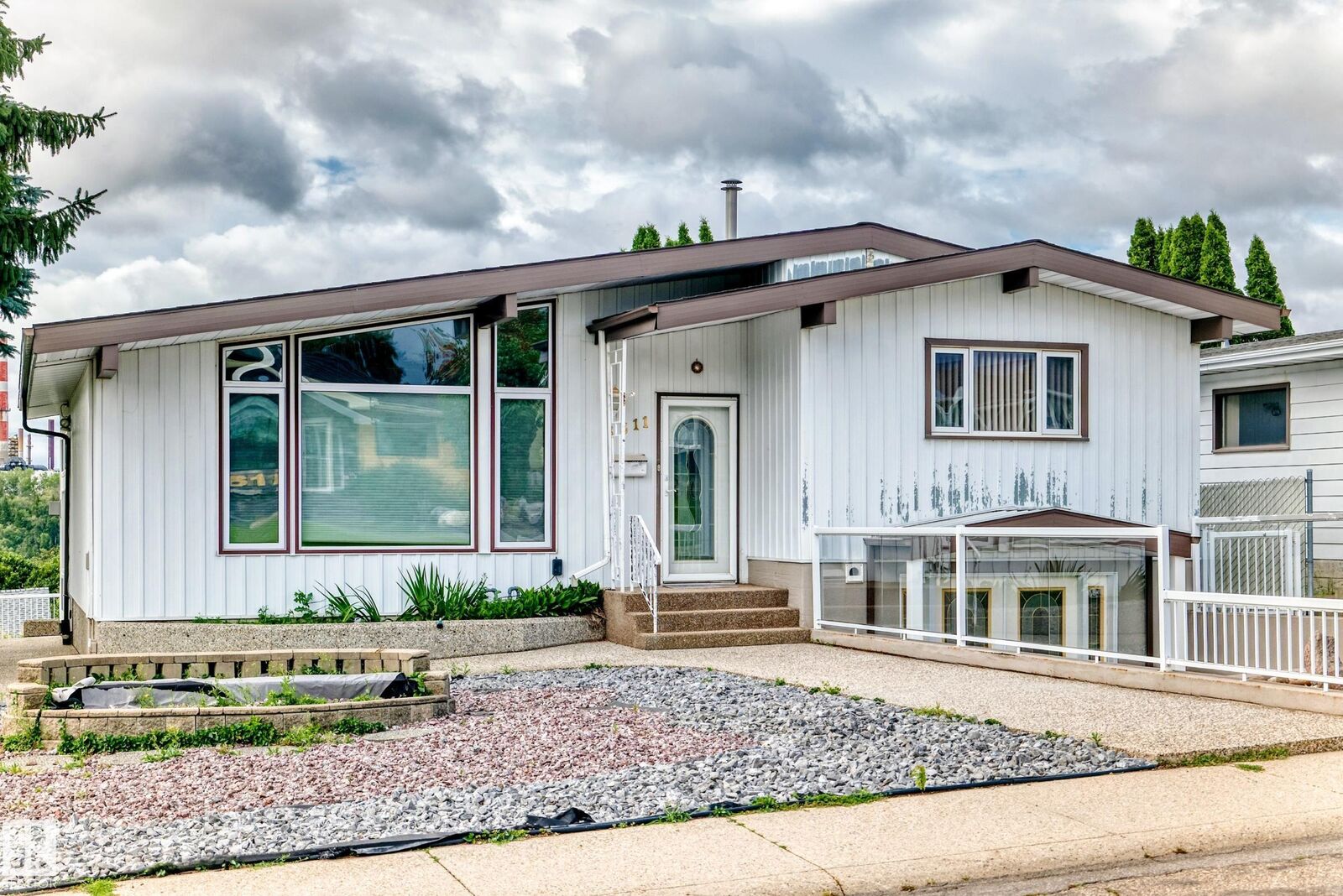 Property Photo:  3311 104 Avenue NW  AB T5W 0A8 
