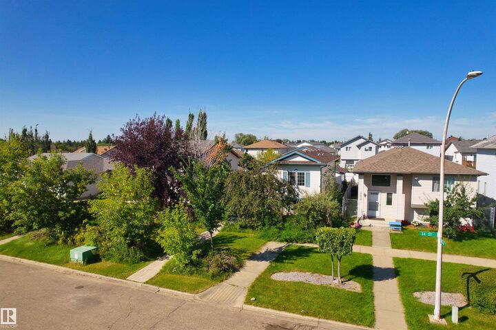 Property Photo:  13028 34 Street NW  AB T5A 5G7 