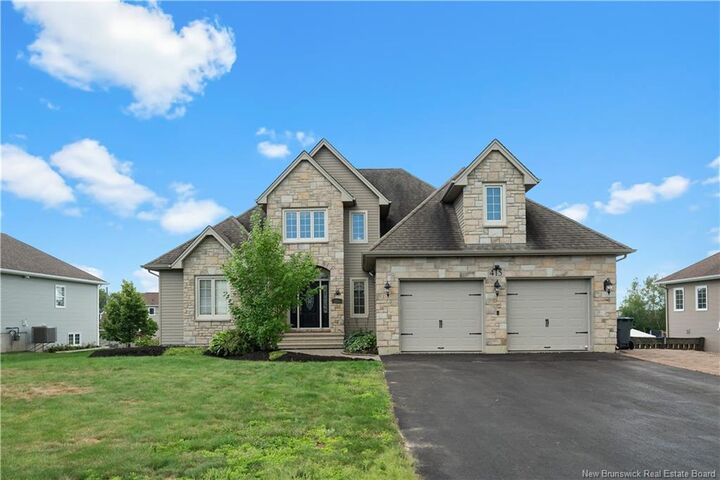 Property Photo: 415 Grande-Vallee Court NB E1A 8S1
